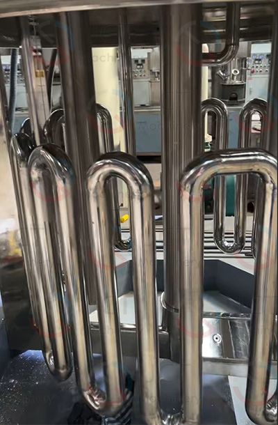 coiled triple shaft mixer